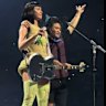 Serial TikTok prankster storms stage and puts arm around Katy Perry during Sydney concert